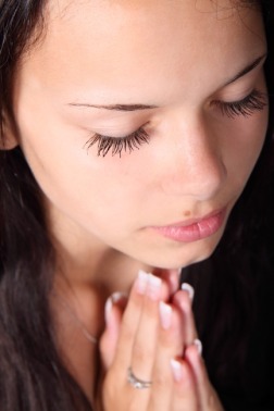 girl-praying-hands-eyelashes-41942-large